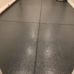 closeup of charcoal epoxy flooring