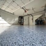 garage with blue and black epoxy flooring
