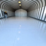 large garage with new epoxy flooring